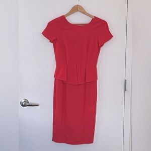(New w/o tags) Awear red dress with structured peplum waist detail. Size UK6